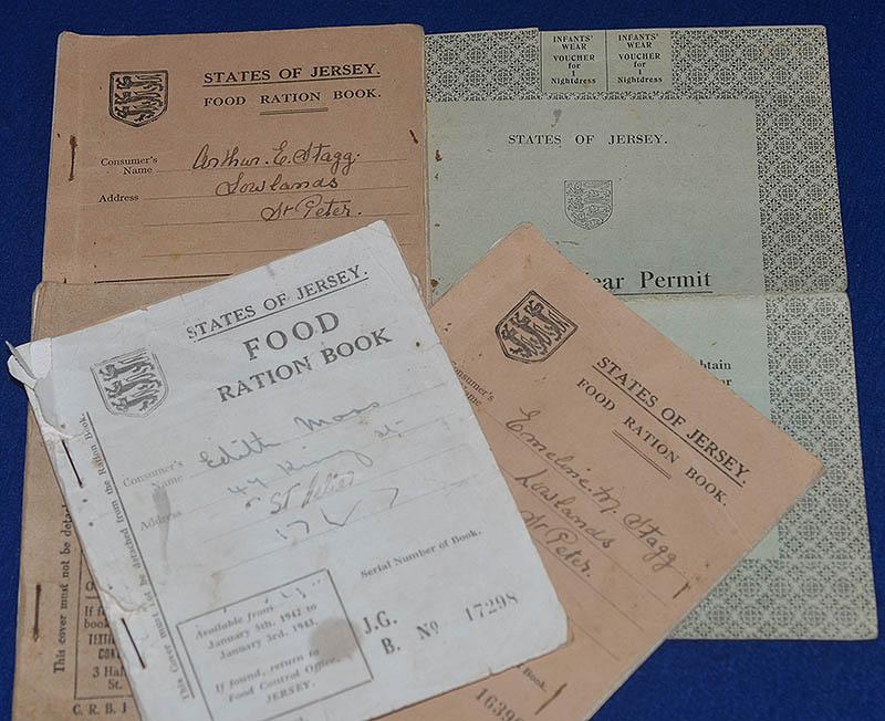COLLECTION OF FIVE CHANEL ISLAND OCUPATION CIVILIAN RATION BOOKS.