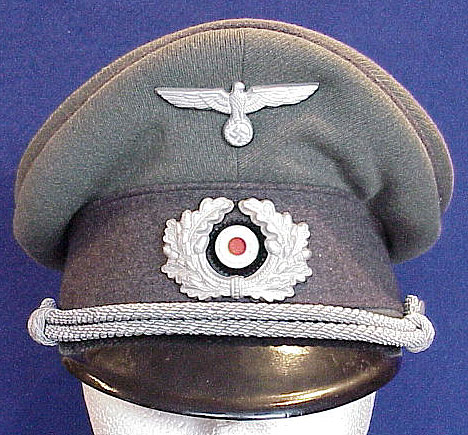 A RARE ARMY SONDERFUHRERS PEAKED CAP BY EREL.