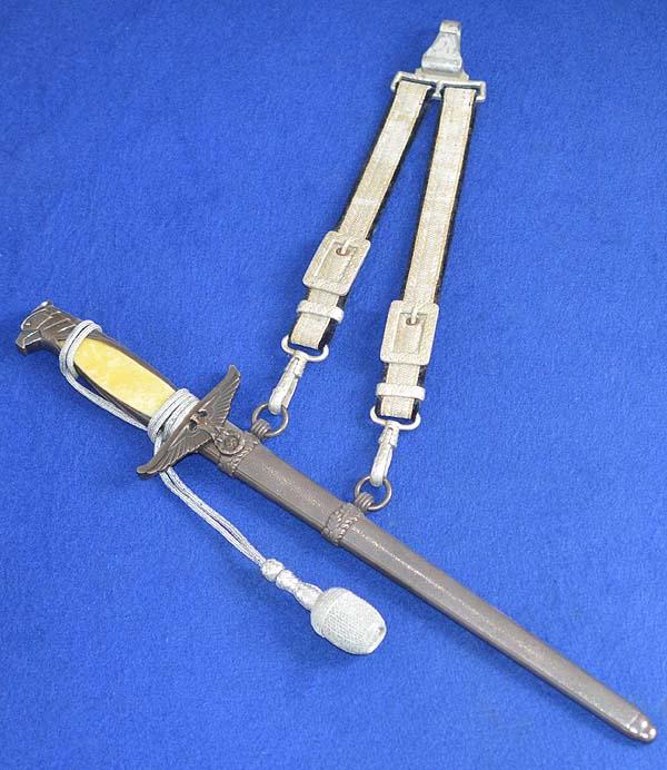 THIRD REICH DIPLOMATIC OFFICIALS DAGGER BY ALCOSO WITH STRAPS AND KNOT.