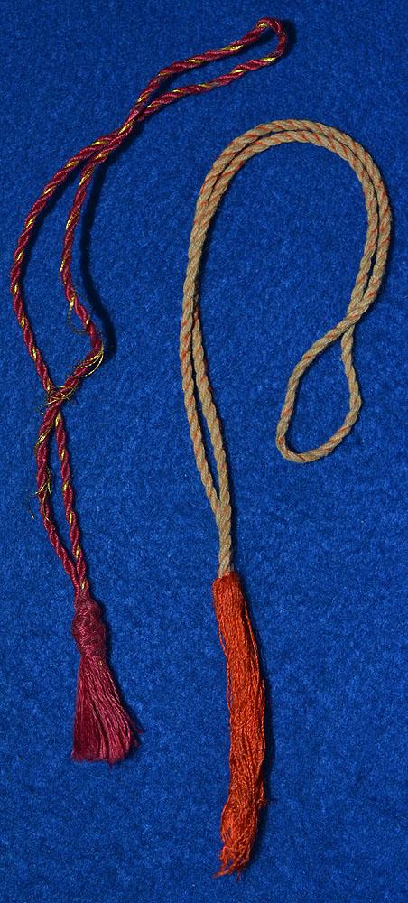 PAIR OF MINIATURE PORTEPEE KNOTS.