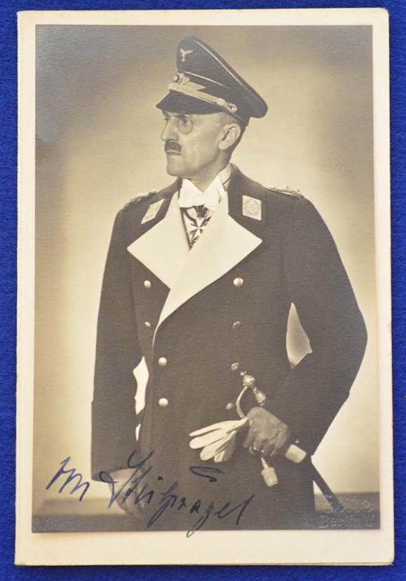 INK SIGNED PHOTOGRAH OF A LUFTWAFFE GENERAL WEARING THE 1ST MODEL LUFTWAFFE SWORD.