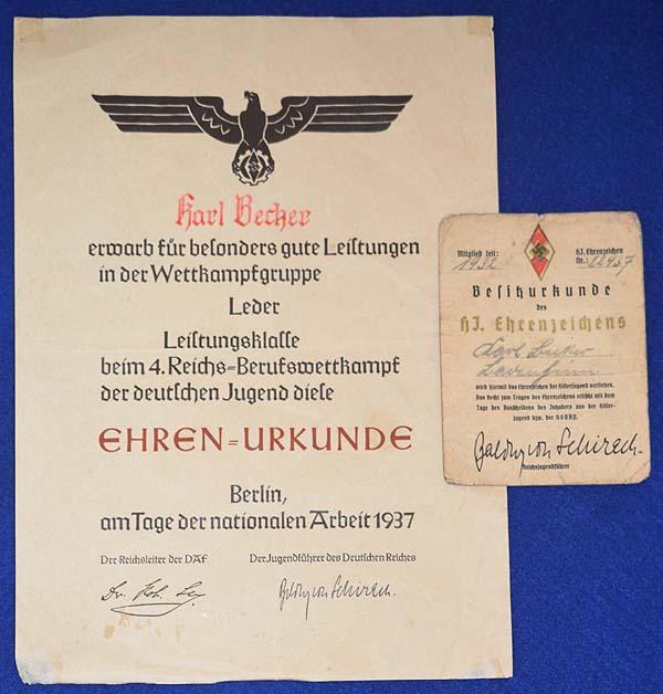 RARE PAIR OF HITLER YOUTH AWARD CITATIONS.