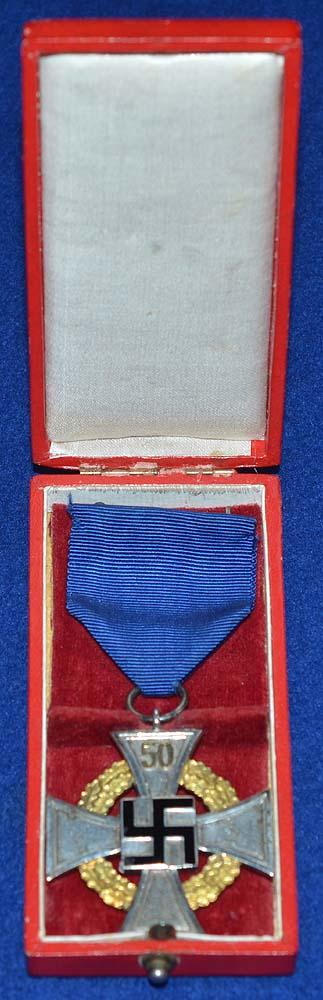 CASED 50 YEAR NAZI FAITHFULL SERVICE CROSS COMPLETE WITH LEATHERETTE ISSUE BOX.