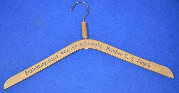 1930'S ADVERTISING CLOTHS HANGER.