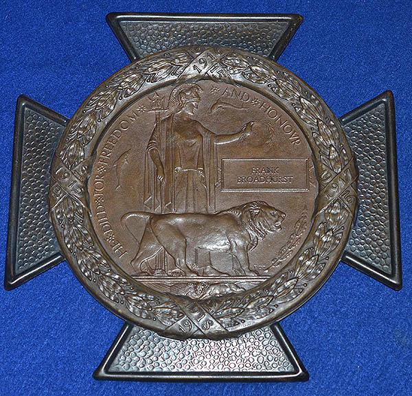 BRITISH WW1 DEATH MADALION IN RARE BRONZE CROSS FRAME.