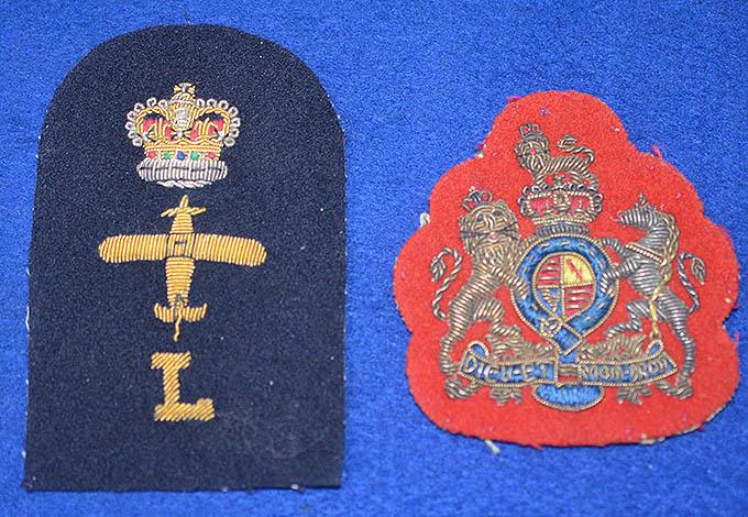 PAIR OF BRITISH MILITARY CLOTH BADGES.