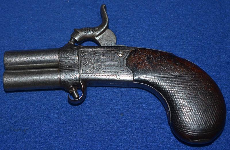 ANTIQUE IRISH OVER AND UNDER PERCUSSION PISTOL.