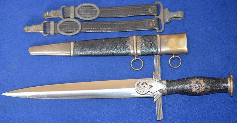 RLB 2ND MODEL LEADERS DAGGER BY WAYERSBERG COMPLETE WITH LEATHER HANGERS.