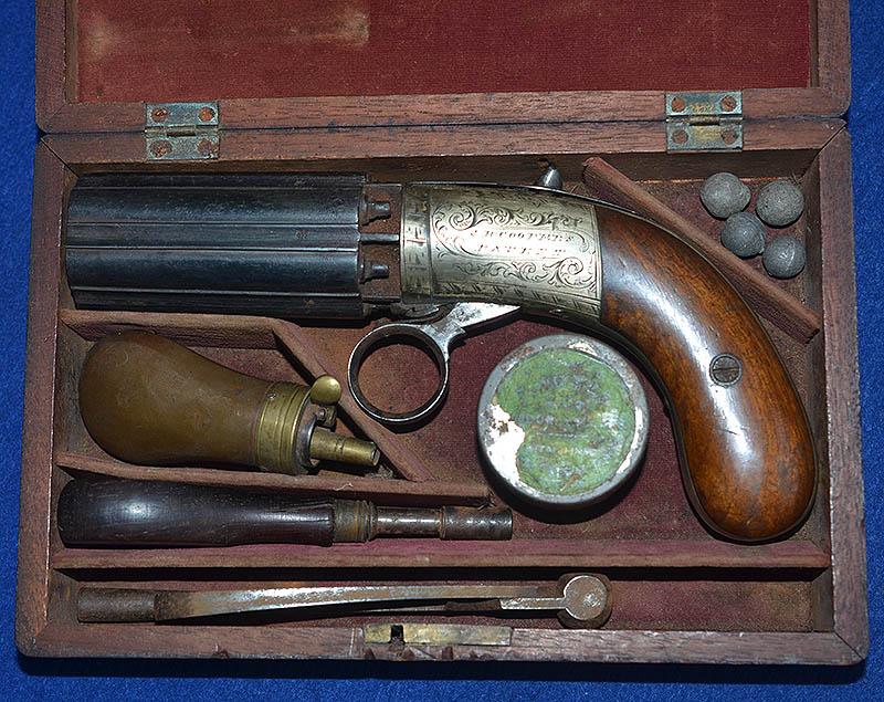 CASED ANTIQUE PEPERBOX PISTOL,NAMED TO THE ORIGINAL OWNER.