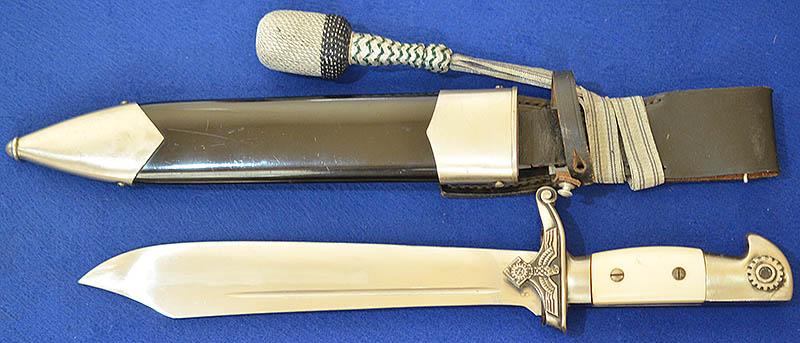 TENO MANS DAGGER BY EICKHORN COMPLETE WITH HANGER AND NCO KNOT, NEAR MINT COMPLETE SET.