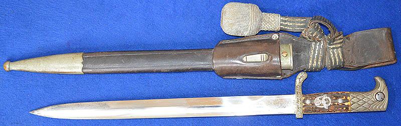 POLCE BAYONET SLOTTED MODEL BY WKC COMPLETE WITH ORIGINAL FROG AND KNOT.
