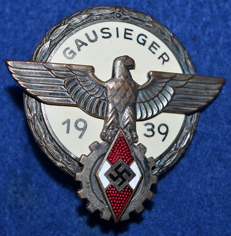 HITLER YOUTH 1939 GAUSIEGER BADGE IN SILVER.