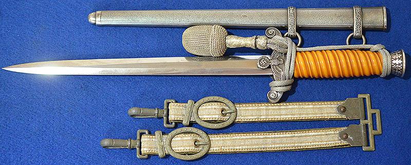 GERMAN THIRD REICH ARMY OFFICERS DAGGER BY EICKHORN COMPLETE WITH STRAPS AND KNOT.