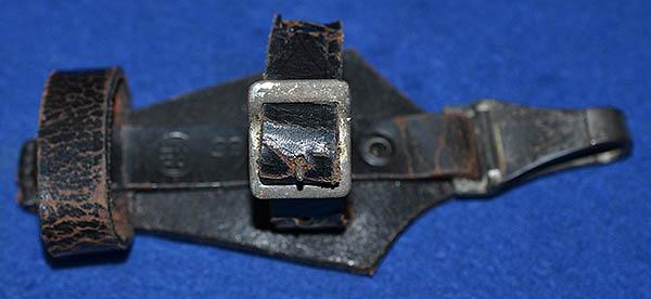 VERTICAL HANGER FOR AN SS DAGGER.