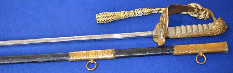 BRITISH WW1 NAVAL OFFICERS SWORD WITH ORIGINAL KNOT.