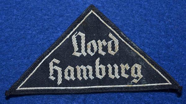 BDM TUNIC DISTRIC TRIANGULAR CLOTH BADGE.