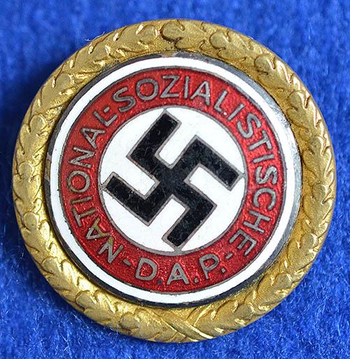 GOLD PARTY BADGE OF THE NSDAP.