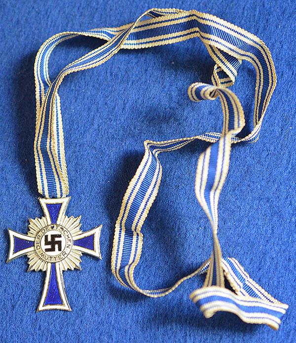 MOTHER CROSS IN SILVER.