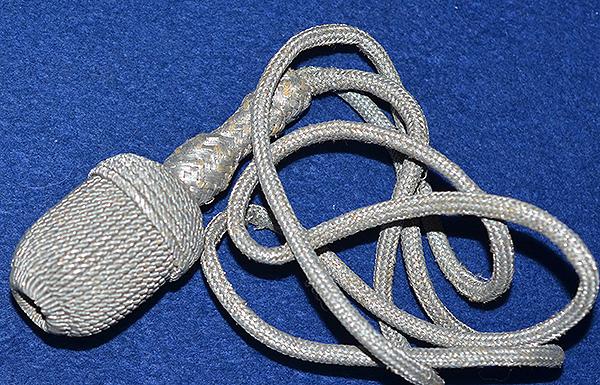 SILVER ARMY DAGGER KNOT.
