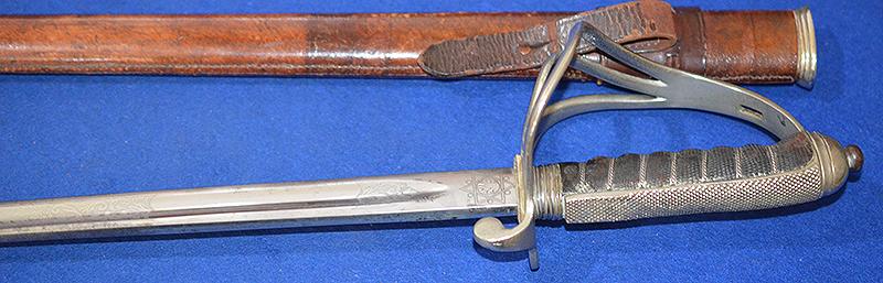 BRITISH WW1 ARTILLERY OFFICERS SWORD WITH ENGRAVED BLADE.
