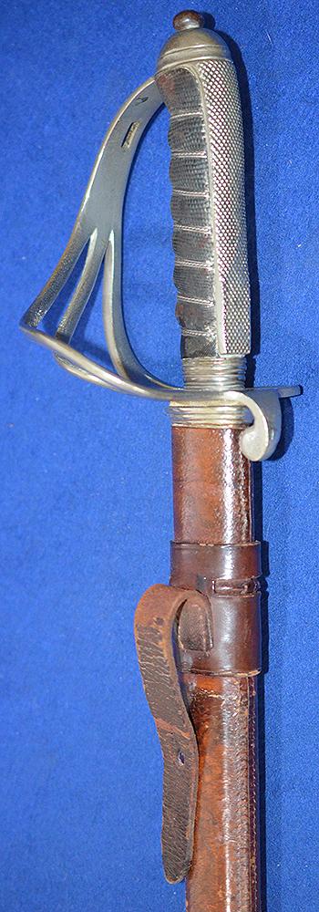 BRITISH WW1 ARTILLERY OFFICERS SWORD WITH ENGRAVED BLADE.