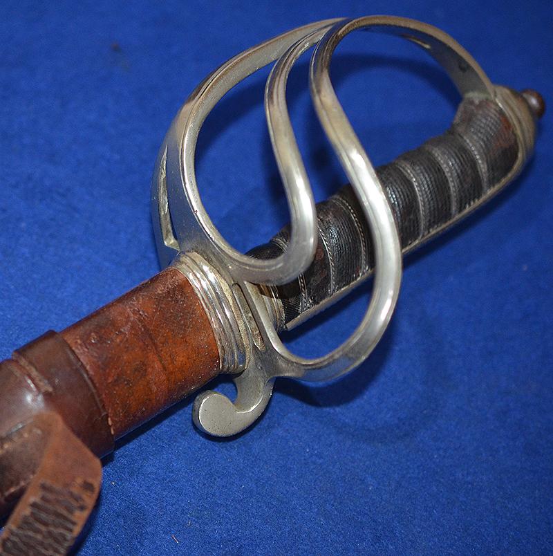 BRITISH WW1 ARTILLERY OFFICERS SWORD WITH ENGRAVED BLADE.