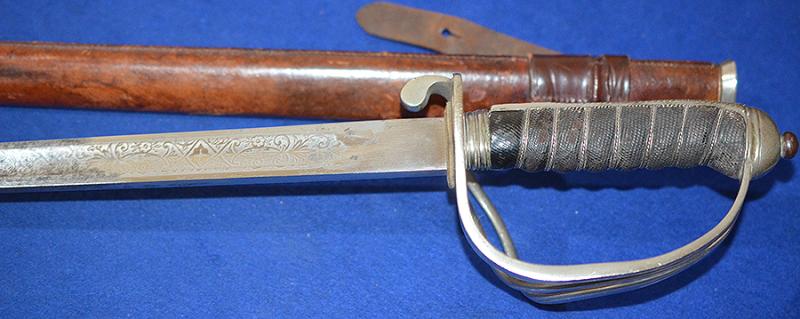 BRITISH WW1 ARTILLERY OFFICERS SWORD WITH ENGRAVED BLADE.