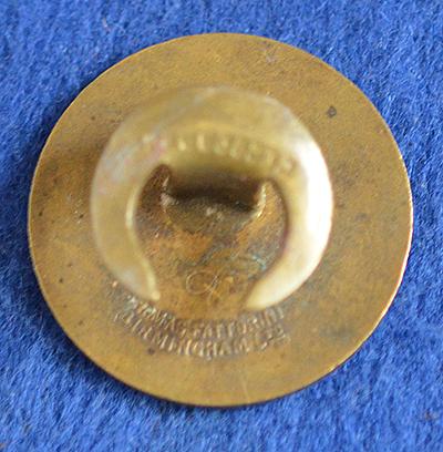 BRITISH SWASTIKA BADGE.
