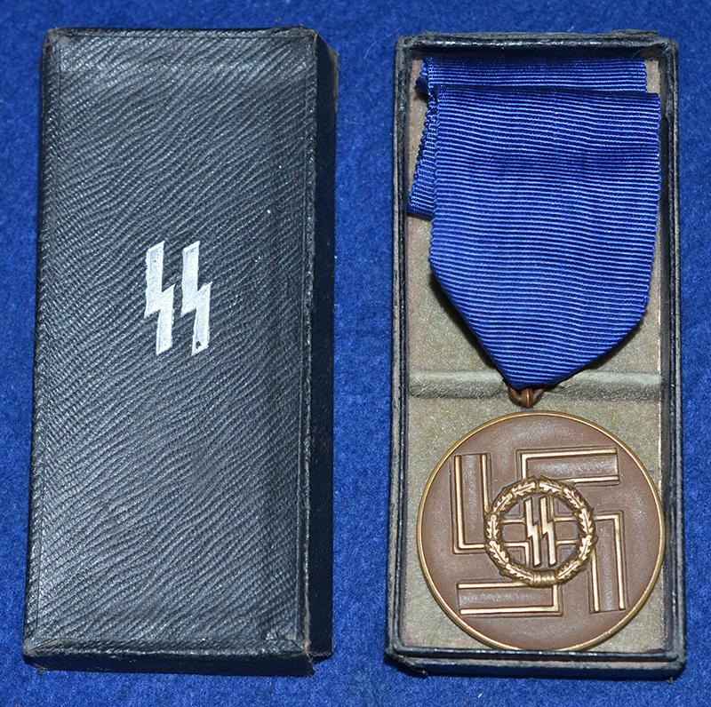 CASED SS 8 YEAR LONG SERVICE MEDAL.