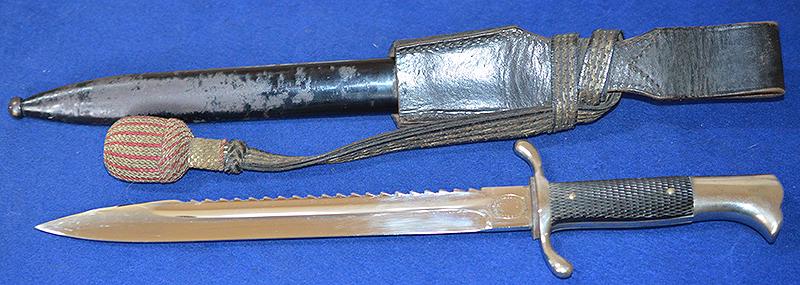THIRD REICH FIRE SERVICE SIDARM WITH SAW BACK BLADE BY KOBER COMPLETE WITH FROG AND KNOT.