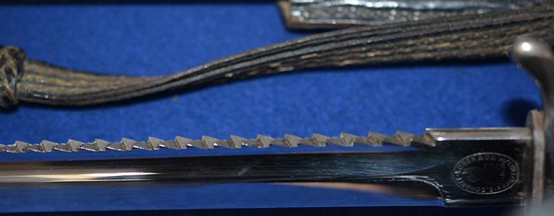 THIRD REICH FIRE SERVICE SIDARM WITH SAW BACK BLADE BY KOBER COMPLETE WITH FROG AND KNOT.