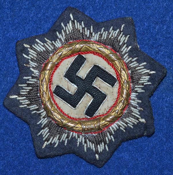 WW2 GERMAN CROSS IN GOLD ON LUFTWAFFE BACKING.