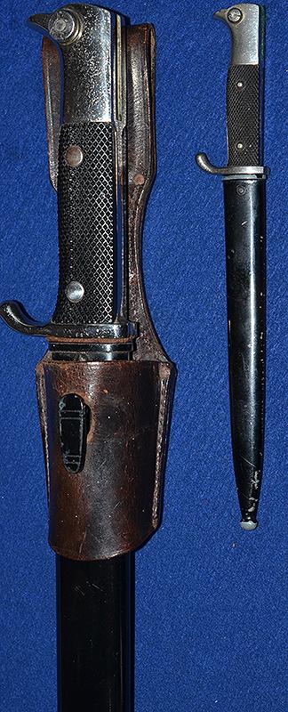 THIRD REICH MINIATURE PACK FACTORY ADVERTSING BAYONET AND SCABBARD.