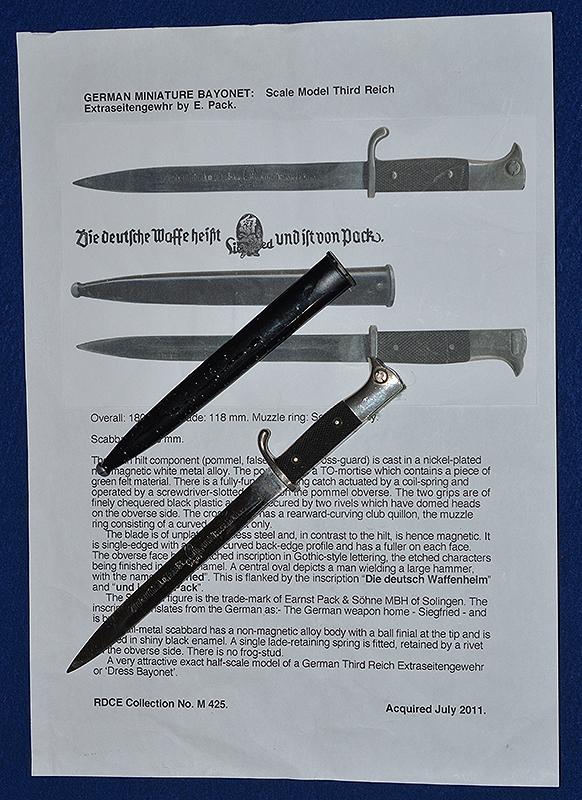 THIRD REICH MINIATURE PACK FACTORY ADVERTSING BAYONET AND SCABBARD.