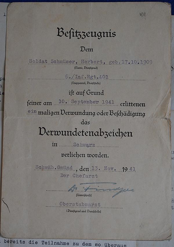 SET OF 10 ARMY AND NSDAP DOCUMENTS TO INFANTRY GEFREITER HERBERT SCHMUSER,KILLED IN ACTION IN RUSSIA 1942.