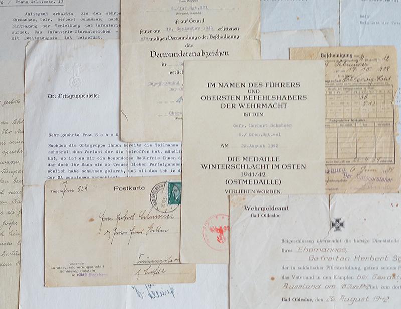 SET OF 10 ARMY AND NSDAP DOCUMENTS TO INFANTRY GEFREITER HERBERT SCHMUSER,KILLED IN ACTION IN RUSSIA 1942.