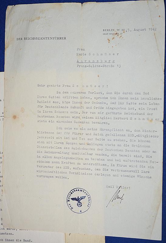 SET OF 10 ARMY AND NSDAP DOCUMENTS TO INFANTRY GEFREITER HERBERT SCHMUSER,KILLED IN ACTION IN RUSSIA 1942.