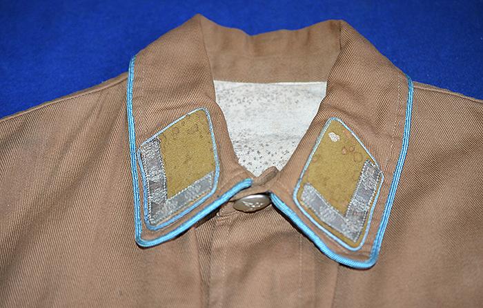 THIRD REICH POLITICAL LEADERS ORTSGRUPPE BROWN SHIRT COMPLETE WITH INSIGNIA.