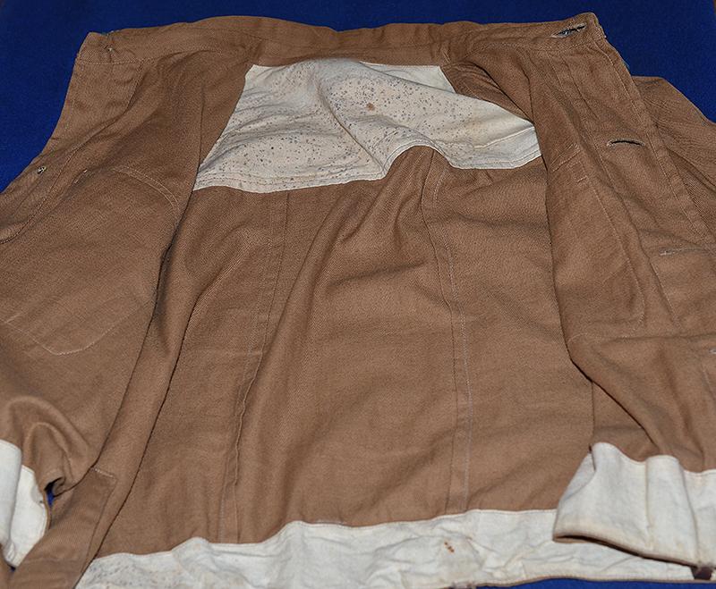 THIRD REICH POLITICAL LEADERS ORTSGRUPPE BROWN SHIRT COMPLETE WITH INSIGNIA.