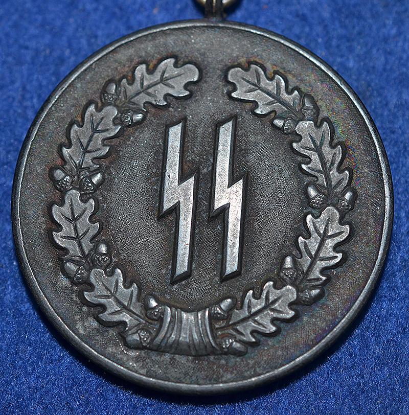SS 4 YEAR SERVICE MEDAL.
