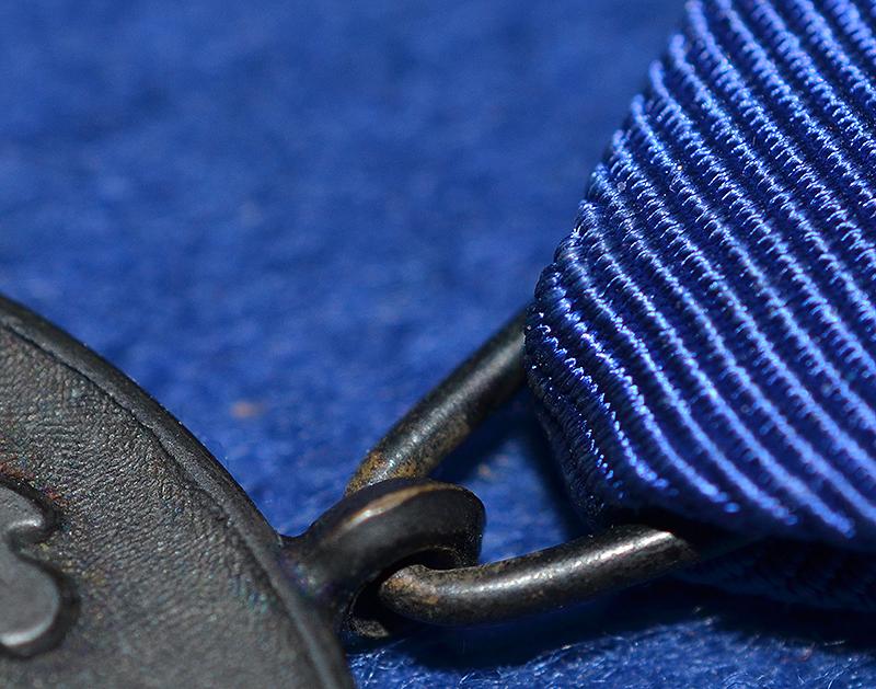 SS 4 YEAR SERVICE MEDAL.