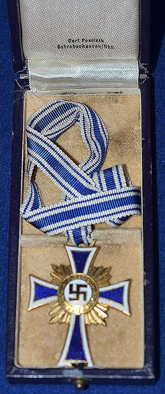 MOTHERS CROSS IN GOLD WITH ISSUE BOX.