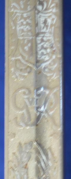 BRITISH 1930'S MINIATURE ARMY OFFICERS SWORD BY WILKINSON OF SUPERB QUALITY.