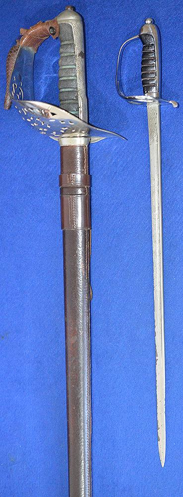 BRITISH 1930'S MINIATURE ARMY OFFICERS SWORD BY WILKINSON OF SUPERB QUALITY.