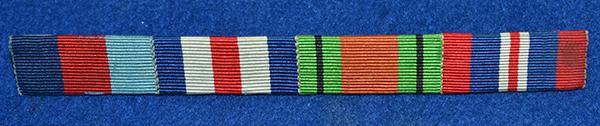 WW2 BRITISH MEDAL RIBBON BAR FOR FOUR MEDALS.