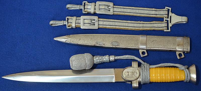 THIRD REICH SOCIAL WELFAIRE LEADERS DAGGER WITH STRAPS AND KNOT.