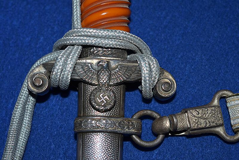 ARMY OFFICERS DAGGER BY EICKHORN COMPLETE WITH STRAP AND KNOT, MINT CONDITION.