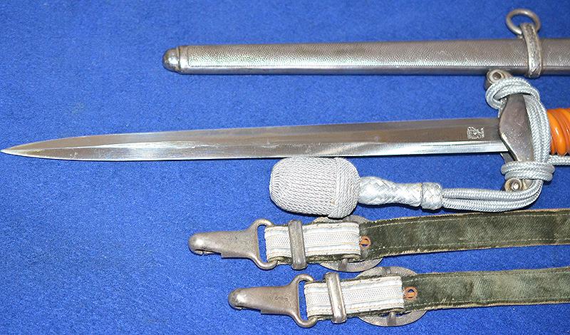 ARMY OFFICERS DAGGER BY EICKHORN COMPLETE WITH STRAP AND KNOT, MINT CONDITION.
