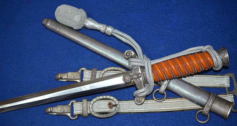 ARMY OFFICERS DAGGER BY EICKHORN COMPLETE WITH STRAP AND KNOT, MINT CONDITION.