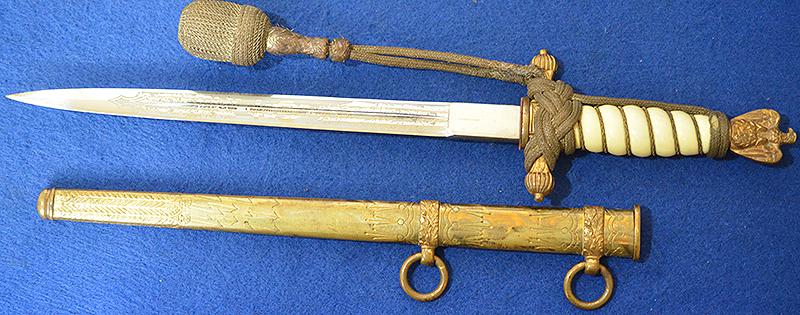 THIRD REICH NAVAL DAGGER WITH SAILING SHIP ETCHED BLADE BY HOLLER COMPLETE WITH GOLD KNOT.